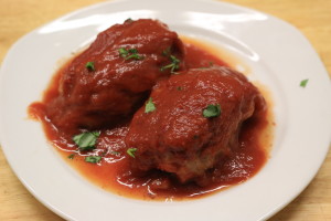 paleo stuffed cabbage rolls on a white plate