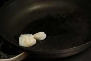 melting lard in a pan