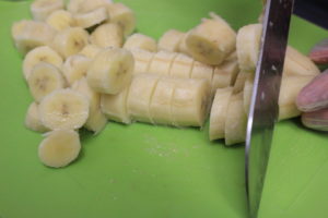 slice frozen bananas for paleo ice cream