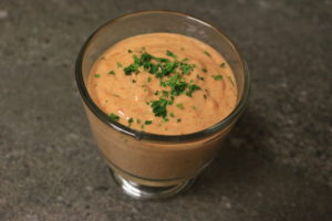 clear cup of paleo aioli