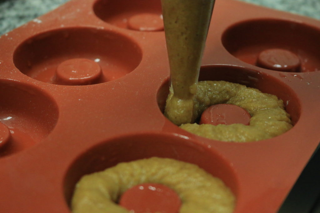 paleo on the go muffin batter poured in donut pan