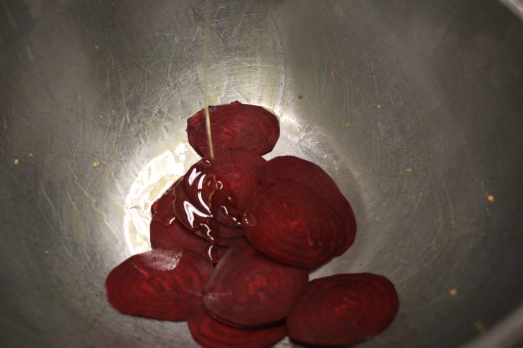 slcied beets drizzled with olive oil