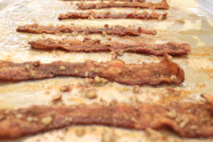 A delicious serving of paleo praline bacon made with Pederson's Sugar Free bacon.