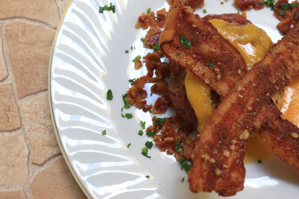 A plate of delicious sugar free and nitrate free paleo praline bacon.