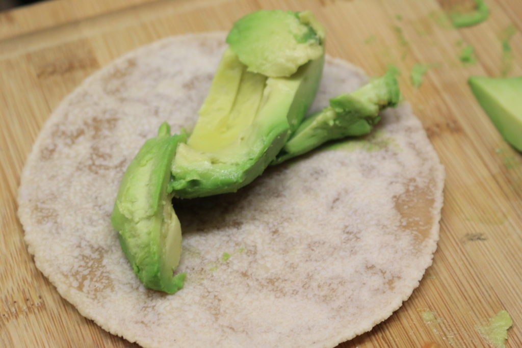 Throw some avocado on out paleo BLT wrap to add some flavor and depth.